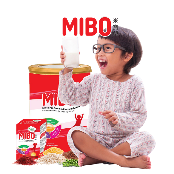 Happy Child Drinks a Glass of Mibo Milk 2